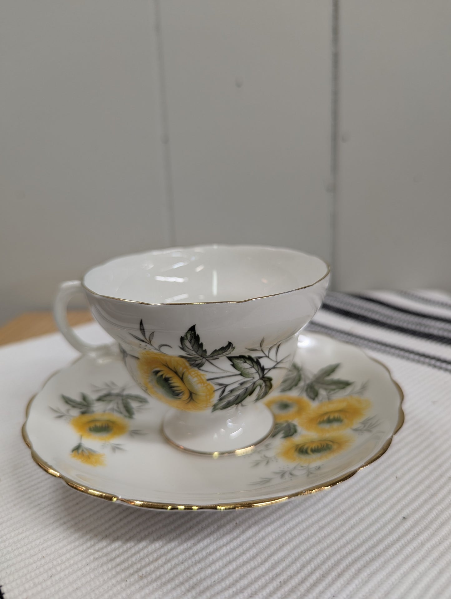 Teacup with Yellow Dandelions