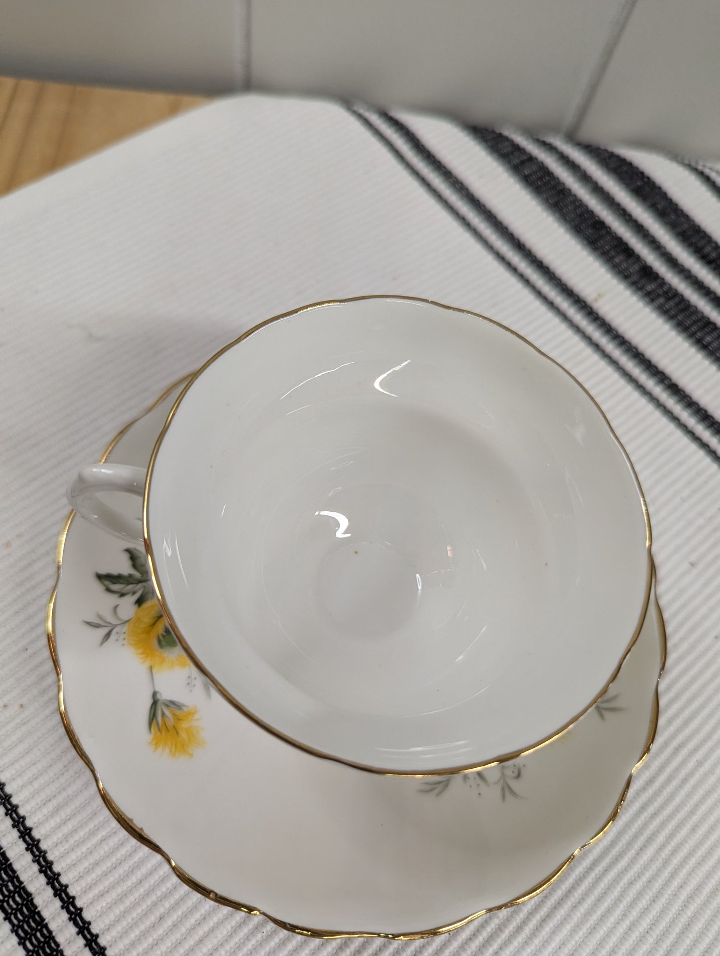 Teacup with Yellow Dandelions
